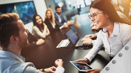 Young executives at a sheet metal meeting